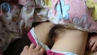 Sleeping girl gets her hairy pussy exploited