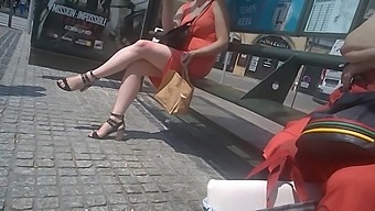 Woman with chubby sexy legs on bus stop