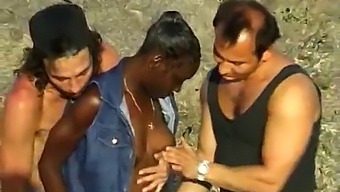 A Dark-Skinned Woman Was Plowed By Two White Men At The Beach.