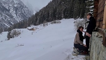 Couple enjoys hidden passionate lovemaking during winter mountain trip